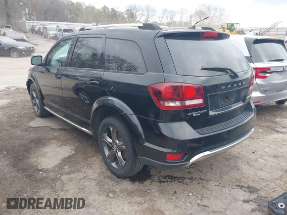 2015 Dodge Journey Crossroad with VIN 3C4PDCGG3FT599771, listed as a IAAI auction lot 41634296 with 76,547 mi miles and . Bid and sale history available at DreamBid. Image 3.
