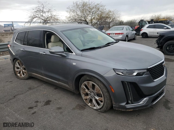 2020 Cadillac XT6 FWD Premium Luxury with VIN 1GYKPCRS5LZ201302, listed as a Copart auction lot 47898165 with 61,527 mi miles and Salvage Title. Bid and sale history available at carsss.com. Image 4.