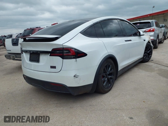 2024 Tesla Model X Plaid with VIN 7SAXCBE63RF440245, listed as a IAAI auction lot 42140051 with Not Provided miles and . Bid and sale history available at DreamBid. Image 4.