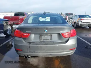 2015 BMW 4 Series 428i xDrive with VIN WBA4C9C55FD331207, listed as a IAAI auction lot 41636906 with 131,306 mi miles and . Bid and sale history available at DreamBid. Image 17.