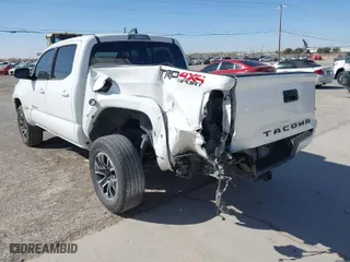 2020 Toyota Tacoma 4WD SR5 with VIN 3TMCZ5AN0LM350742, listed as a IAAI auction lot 41813786 with 84,109 mi miles. Bid and sale history available at carsss.com. Image 3.