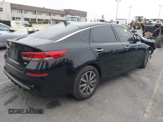 2019 Kia Optima EX with VIN 5XXGU4L14KG290842, listed as a IAAI auction lot 42030617 with Not Provided miles and . Bid and sale history available at carsss.com. Image 4.