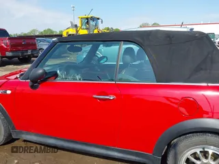 2006 MINI Convertible S with VIN WMWRH33596TK58563, listed as a IAAI auction lot 42210790 with 102,476 mi miles and . Bid and sale history available at DreamBid. Image 14.