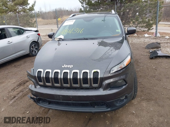 2015 Jeep Cherokee Latitude with VIN 1C4PJMCS9FW769294, listed as a IAAI auction lot 41810346 with 94,975 mi miles and . Bid and sale history available at DreamBid. Image 13.