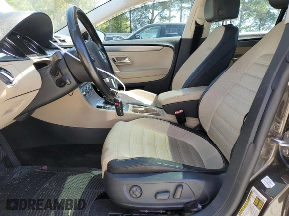 2013 Volkswagen CC Lux with VIN WVWRN7AN4DE546711, listed as a Copart auction lot 52673205 with 106,700 mi miles and Salvage Title. Bid and sale history available at DreamBid. Image 7.