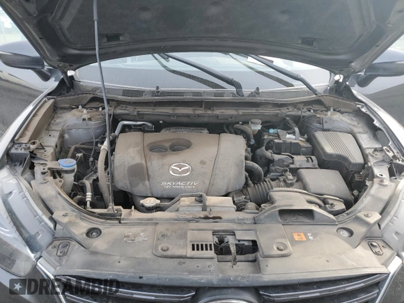 2016 Mazda CX-5 Grand Touring with VIN JM3KE4DY0G0876540, listed as a Copart auction lot 42132815 with 110,158 mi miles and Salvage Title. Bid and sale history available at DreamBid. Image 13.