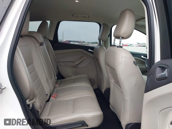 2018 Ford Escape Titanium with VIN 1FMCU9J98JUB87867, listed as a IAAI auction lot 42300123 with 48,357 mi miles and . Bid and sale history available at DreamBid. Image 8.