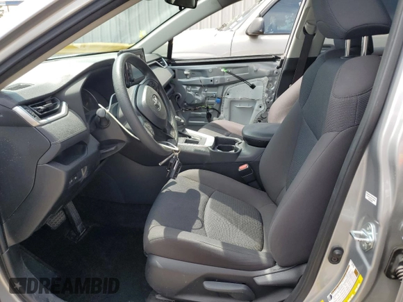 2019 Toyota RAV4 LE with VIN JTMH1RFV0KJ006644, listed as a Copart auction lot 59546835 with 101,050 mi miles and Salvage title. Bid and sale history available at DreamBid. Image 7.