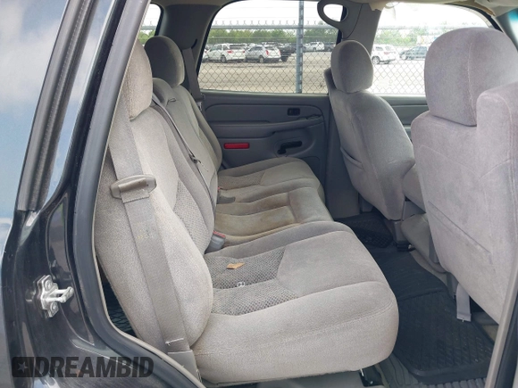 2005 Chevrolet Tahoe LS with VIN 1GNEC13V35R263104, listed as a IAAI auction lot 41918482 with 208,520 mi miles and . Bid and sale history available at DreamBid. Image 8.