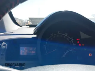 2013 Scion iQ z VIN JTNJJXB00DJ022972, wystawiony jako IAAI lot #41841135 z przebiegiem 105 096 mil mil oraz . Historia ofert i sprzedaży dostępna na DreamBid. Obrazek 7.