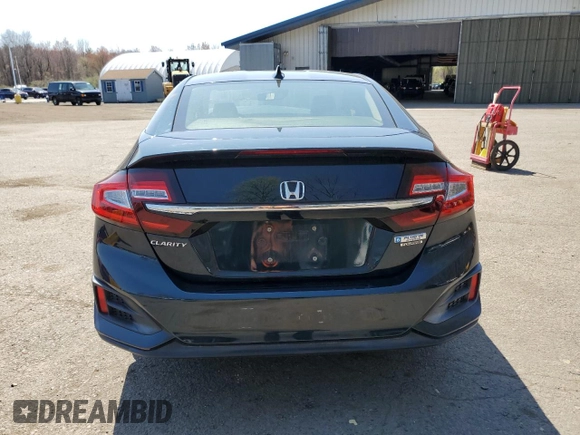2018 Honda Clarity Touring with VIN JHMZC5F34JC015578, listed as a Copart auction lot 54193505 with 92,510 mi miles and Salvage Title. Bid and sale history available at DreamBid. Image 6.