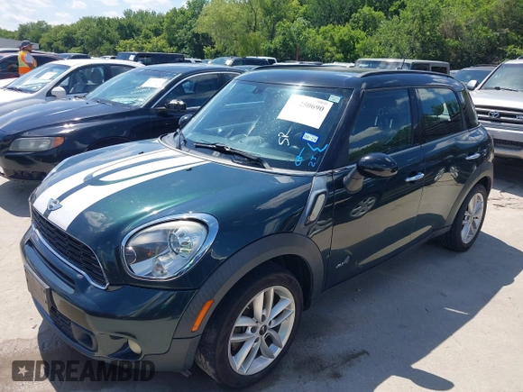 2011 MINI Countryman S with VIN WMWZC5C53BWM10484, listed as a IAAI auction lot 42250690 with 113,534 mi miles and . Bid and sale history available at DreamBid. Image 2.