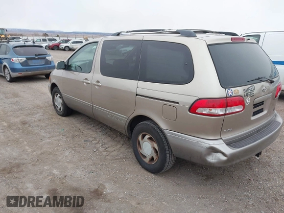 2002 Toyota Sienna LE with VIN 4T3ZF13C42U418853, listed as a IAAI auction lot 41248253 with 193,986 mi miles. Bid and sale history available at carsss.com. Image 3.