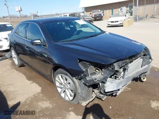2015 Chevrolet Malibu LTZ with VIN 1G11F5SLXFF173112, listed as a IAAI auction lot 41676519 with 167,885 mi miles. Bid and sale history available at carsss.com. Image 1.