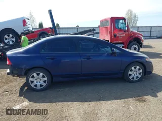 2007 Honda Civic Sdn LX with VIN 1HGFA16587L124463, listed as a IAAI auction lot 42042736 with 189,929 mi miles. Bid and sale history available at carsss.com. Image 14.