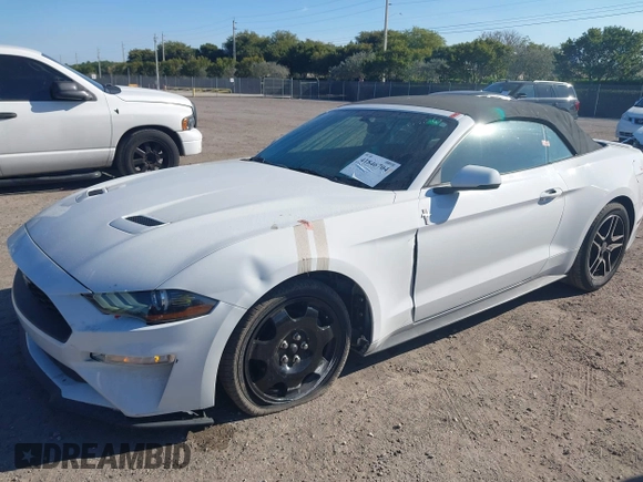 2019 Ford Mustang EcoBoost z VIN 1FATP8UH8K5162526, wystawiony jako IAAI lot #41846704 z przebiegiem 84 527 mil mil oraz . Historia ofert i sprzedaży dostępna na DreamBid. Obrazek 21.