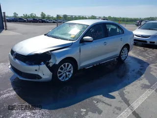 2011 Volkswagen Jetta SE with VIN 3VWDZ7AJ6BM346719, listed as a IAAI auction lot 42287049 with 179,837 mi miles and . Bid and sale history available at DreamBid. Image 2.