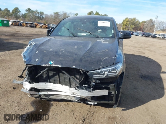 2022 BMW X4 M40i with VIN 5UX43DT0XN9L33898, listed as a IAAI auction lot 41642374 with 8 mi miles and . Bid and sale history available at DreamBid. Image 12.