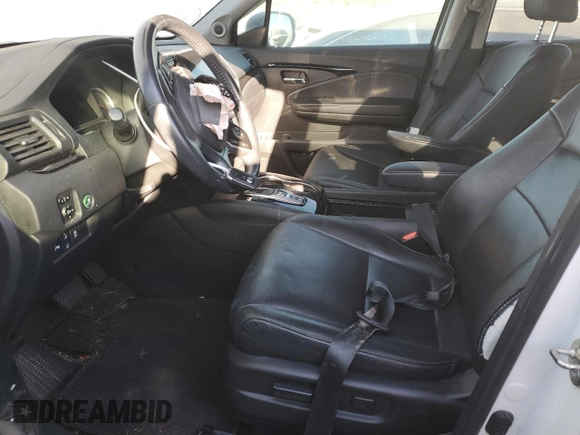 2020 Honda Pilot Touring 8-Passenger with VIN 5FNYF5H97LB009821, listed as a Copart auction lot 70979274 with 70,322 mi miles and Salvage Title. Bid and sale history available at DreamBid. Image 7.