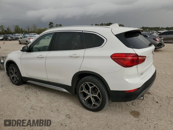 2019 BMW X1 sDrive28i with VIN WBXHU7C57K3H44192, listed as a Copart auction lot 49882335 with 79,350 mi miles and Salvage Title. Bid and sale history available at carsss.com. Image 2.