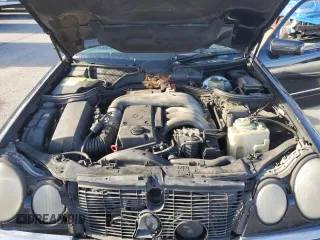 1996 Mercedes-Benz E Class with VIN WDBJF20F9TJ023003, listed as a Copart auction lot 86356784 with 230,944 mi miles and Salvage Title. Bid and sale history available at carsss.com. Image 11.