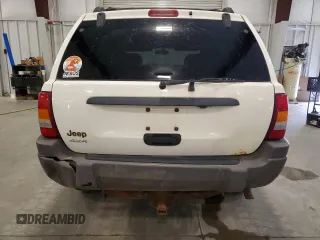 2004 Jeep Grand Cherokee Laredo with VIN 1J4GW48S94C432692, listed as a Copart auction lot 52506585 with 269,983 mi miles and Salvage Title. Bid and sale history available at carsss.com. Image 6.