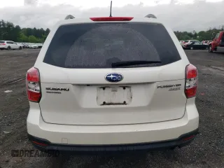 2014 Subaru Forester Premium z VIN JF2SJAEC1EH438969, wystawiony jako Copart lot #57674995 z przebiegiem 160 874 mil mil oraz Szkody całkowita. Historia ofert i sprzedaży dostępna na DreamBid. Obrazek 6.