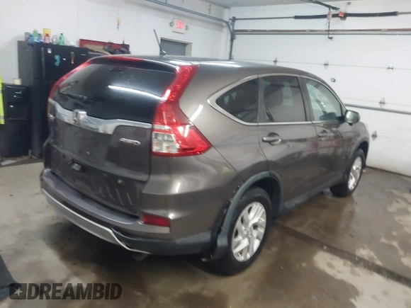 2015 Honda CR-V EX with VIN 2HKRM4H56FH662101, listed as a IAAI auction lot 41623155 with 173,554 mi miles and . Bid and sale history available at DreamBid. Image 4.