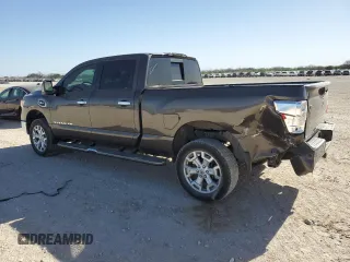 2017 Nissan Titan XD SV with VIN 1N6AA1F28HN551630, listed as a Copart auction lot 87104504 with 136,518 mi miles and Salvage Title. Bid and sale history available at carsss.com. Image 2.