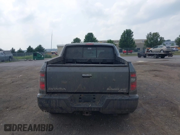 2013 Honda Ridgeline RTL with VIN 5FPYK1F56DB004834, listed as a IAAI auction lot 42706361 with 230,000 mi miles and . Bid and sale history available at DreamBid. Image 16.