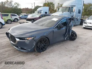 2022 Mazda 3 Carbon Edition z VIN JM1BPACL2N1509492, wystawiony jako IAAI lot #41198183 z przebiegiem Nie podano mil oraz . Historia ofert i sprzedaży dostępna na DreamBid. Obrazek 16.