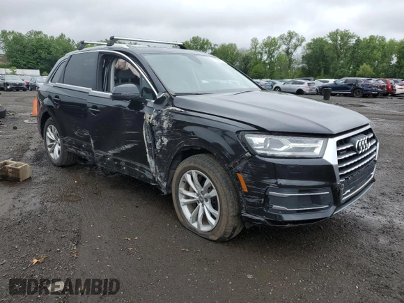 2019 Audi Q7 Premium with VIN WA1AHAF75KD024615, listed as a Copart auction lot 61334565 with 56,833 mi miles and Salvage title. Bid and sale history available at DreamBid. Image 4.