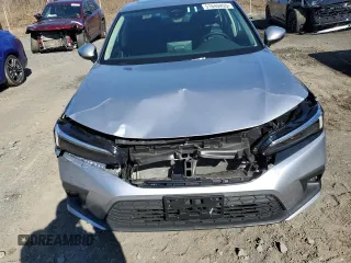2024 Honda Civic Sedan Touring with VIN 2HGFE1F95RH325566, listed as a Copart auction lot 51640455 with 7,127 mi miles and Salvage Title. Bid and sale history available at carsss.com. Image 5.