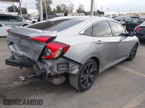 2019 Honda Civic Sport with VIN 2HGFC2F84KH576622, listed as a IAAI auction lot 41494019 with 87,495 mi miles and . Bid and sale history available at DreamBid. Image 4.