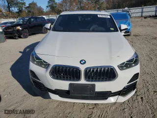 2021 BMW X2 xDrive28i with VIN WBXYJ1C00M5S24107, listed as a Copart auction lot 81824504 with 29,376 mi miles and Salvage Title. Bid and sale history available at carsss.com. Image 5.