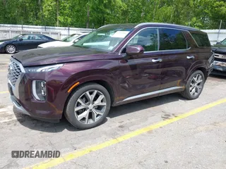2021 Hyundai Palisade Limited with VIN KM8R5DHE0MU263048, listed as a IAAI auction lot 42365566 with 90,102 mi miles and . Bid and sale history available at DreamBid. Image 2.