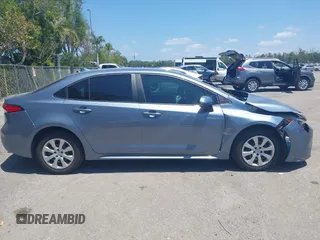 2023 Toyota Corolla LE with VIN 5YFB4MDE9PP016692, listed as a IAAI auction lot 42136141 with 34,671 mi miles and . Bid and sale history available at carsss.com. Image 13.