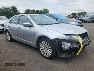 2012 Ford Fusion Hybrid z VIN 3FADP0L34CR227740, wystawiony jako Copart lot #64989475 z przebiegiem 134 862 mil mil oraz Szkoda całkowita • Salvage title. Historia ofert i sprzedaży dostępna na DreamBid. Obrazek 4.