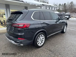2021 BMW X5 sDrive40i with VIN 5UXCR4C04M9G59370, listed as a IAAI auction lot 41592538 with 132,083 mi miles. Bid and sale history available at carsss.com. Image 4.