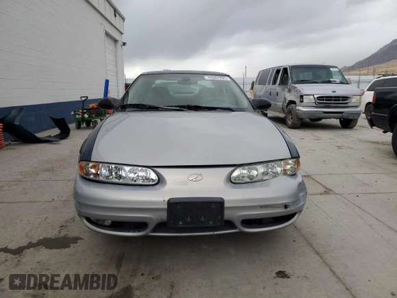 2002 Oldsmobile Alero GL1 z VIN 1G3NL52E52C225101, wystawiony jako Copart lot #44062285 z przebiegiem 92 243 mil mil oraz Szkoda całkowita • Salvage title. Historia ofert i sprzedaży dostępna na DreamBid. Obrazek 5.