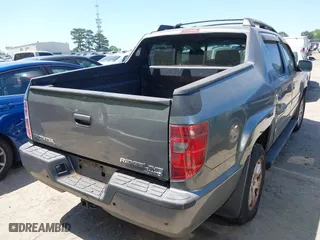 2009 Honda Ridgeline RTS with VIN 5FPYK16409B105186, listed as a IAAI auction lot 42003632 with 153,072 mi miles. Bid and sale history available at carsss.com. Image 4.