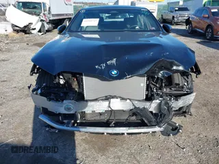 2024 BMW i5 eDrive40 with VIN WBY33FK00RCP37858, listed as a IAAI auction lot 41016747 with Not provided miles and . Bid and sale history available at DreamBid. Image 12.
