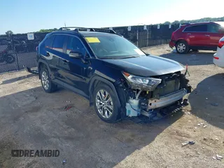 2021 Toyota RAV4 XLE Premium with VIN 2T3C1RFVXMW105387, listed as a IAAI auction lot 42238526 with 58,627 mi miles and . Bid and sale history available at DreamBid. Image 1.