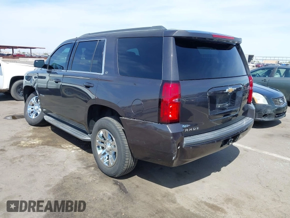 2017 Chevrolet Tahoe LT with VIN 1GNSCBKC5HR120345, listed as a IAAI auction lot 41988737 with 110,217 mi miles and . Bid and sale history available at DreamBid. Image 3.