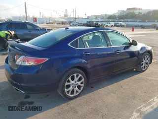 2009 Mazda 6 S Grand Touring with VIN 1YVHP82BX95M21357, listed as a IAAI auction lot 42013043 with 119,701 mi miles and . Bid and sale history available at DreamBid. Image 4.