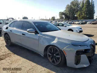 2024 BMW 7 Series 740i with VIN WBA23EH04RCR48184, listed as a Copart auction lot 69965604 with 5,285 mi miles and Salvage Title. Bid and sale history available at carsss.com. Image 4.