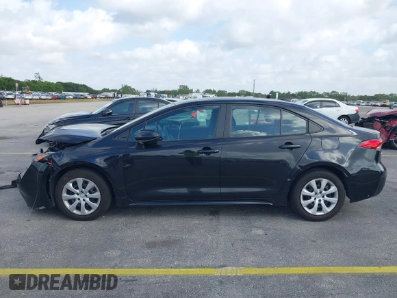 2022 Toyota Corolla LE with VIN 5YFEPMAE6NP348613, listed as a IAAI auction lot 41709618 with 64,406 mi miles and . Bid and sale history available at DreamBid. Image 14.