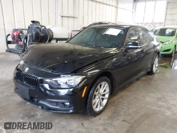 2016 BMW 3 Series 320i with VIN WBA8A9C52GK616953, listed as a IAAI auction lot 41227029 with 73,741 mi miles. Bid and sale history available at carsss.com. Image 2.