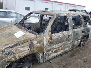 2005 Cadillac Escalade z VIN 1GYEC63N45R217863, wystawiony jako IAAI lot #41913229 z przebiegiem Nie podano mil oraz . Historia ofert i sprzedaży dostępna na DreamBid. Obrazek 6.