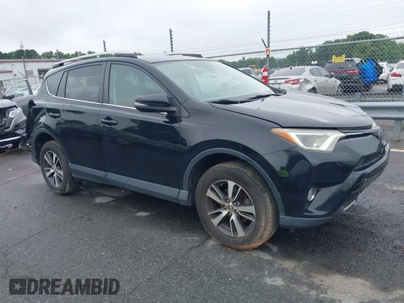 2018 Toyota RAV4 XLE with VIN 2T3WFREVXJW501296, listed as a IAAI auction lot 42358130 with 163,669 mi miles and . Bid and sale history available at DreamBid. Image 1.